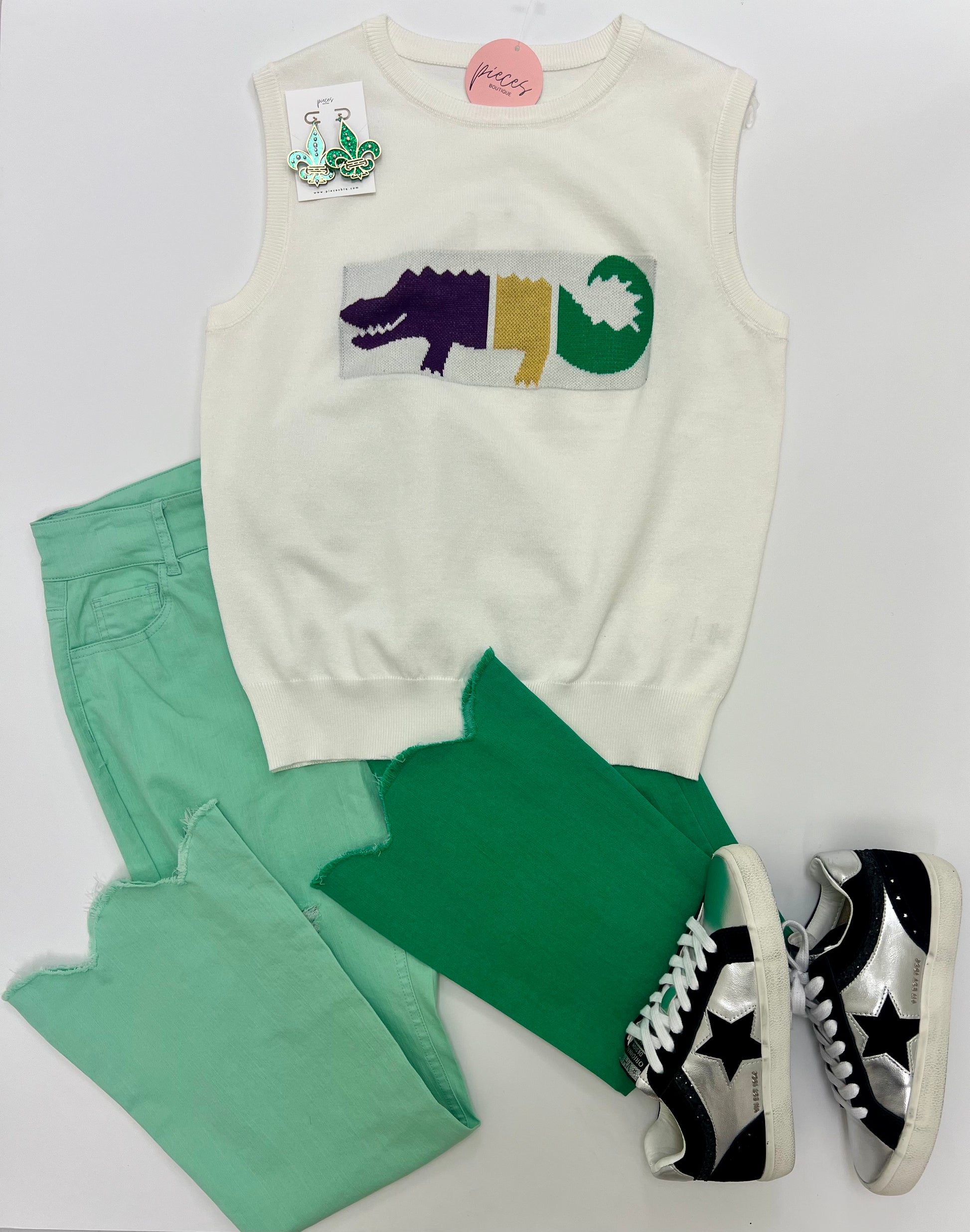 Sweater tank with pants shoes and earrings