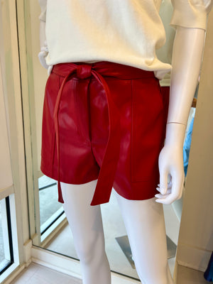 Red leather shorts