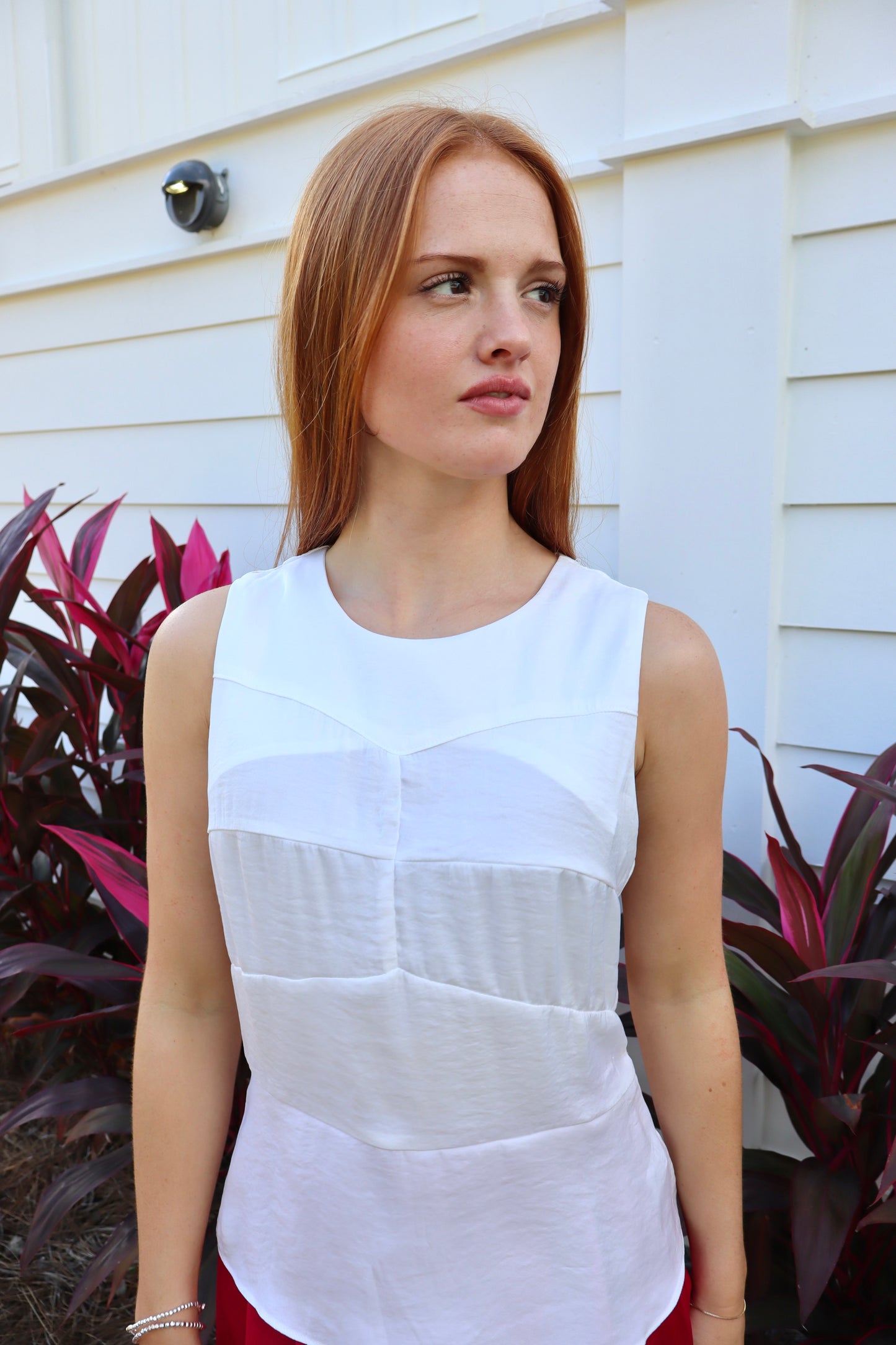 White sleeveless top