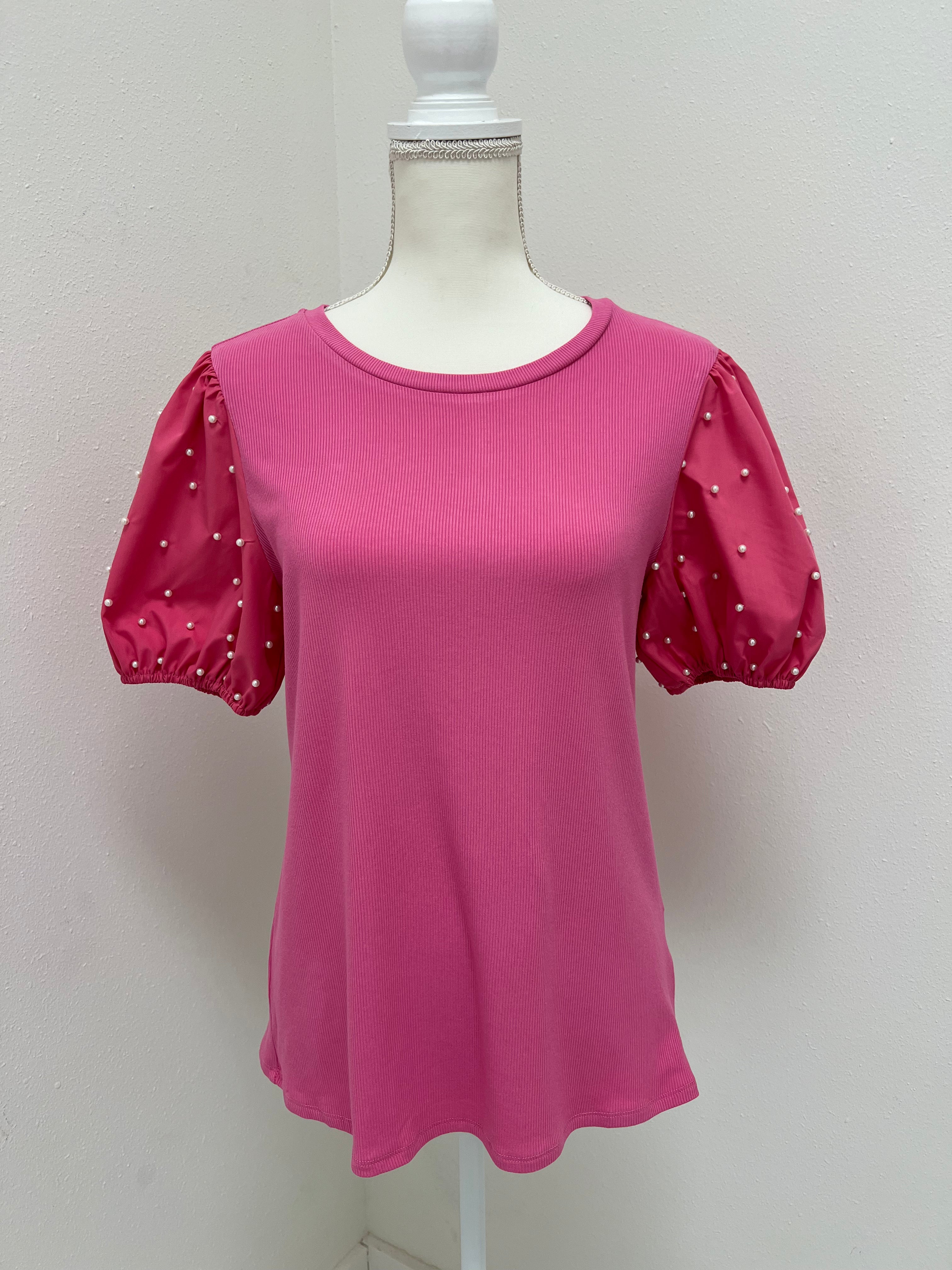 Pink top with short puff sleeves