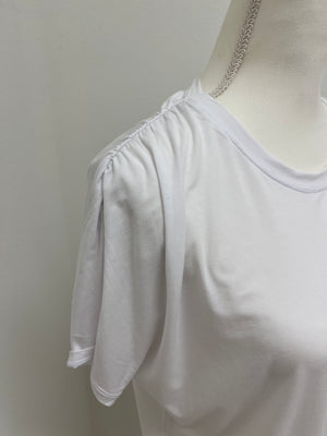 Shoulder view of white tee