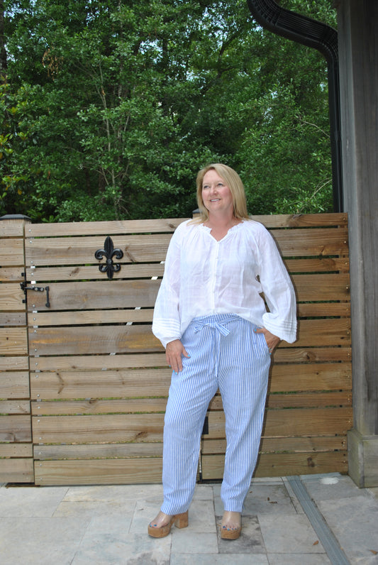 Blue striped pants with white top