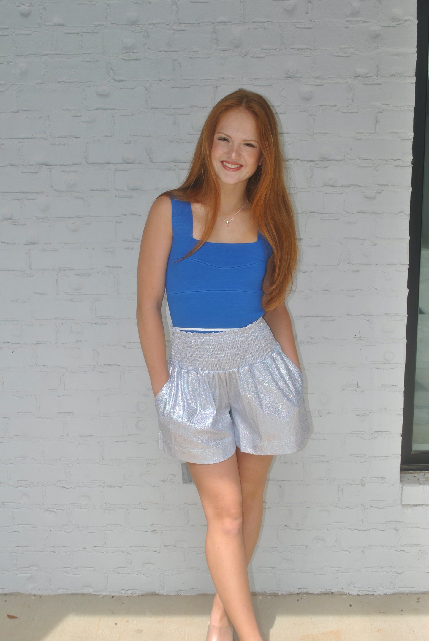 Metallic shorts with blue tank