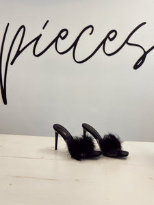 FAMOUS FEATHERED HEELS